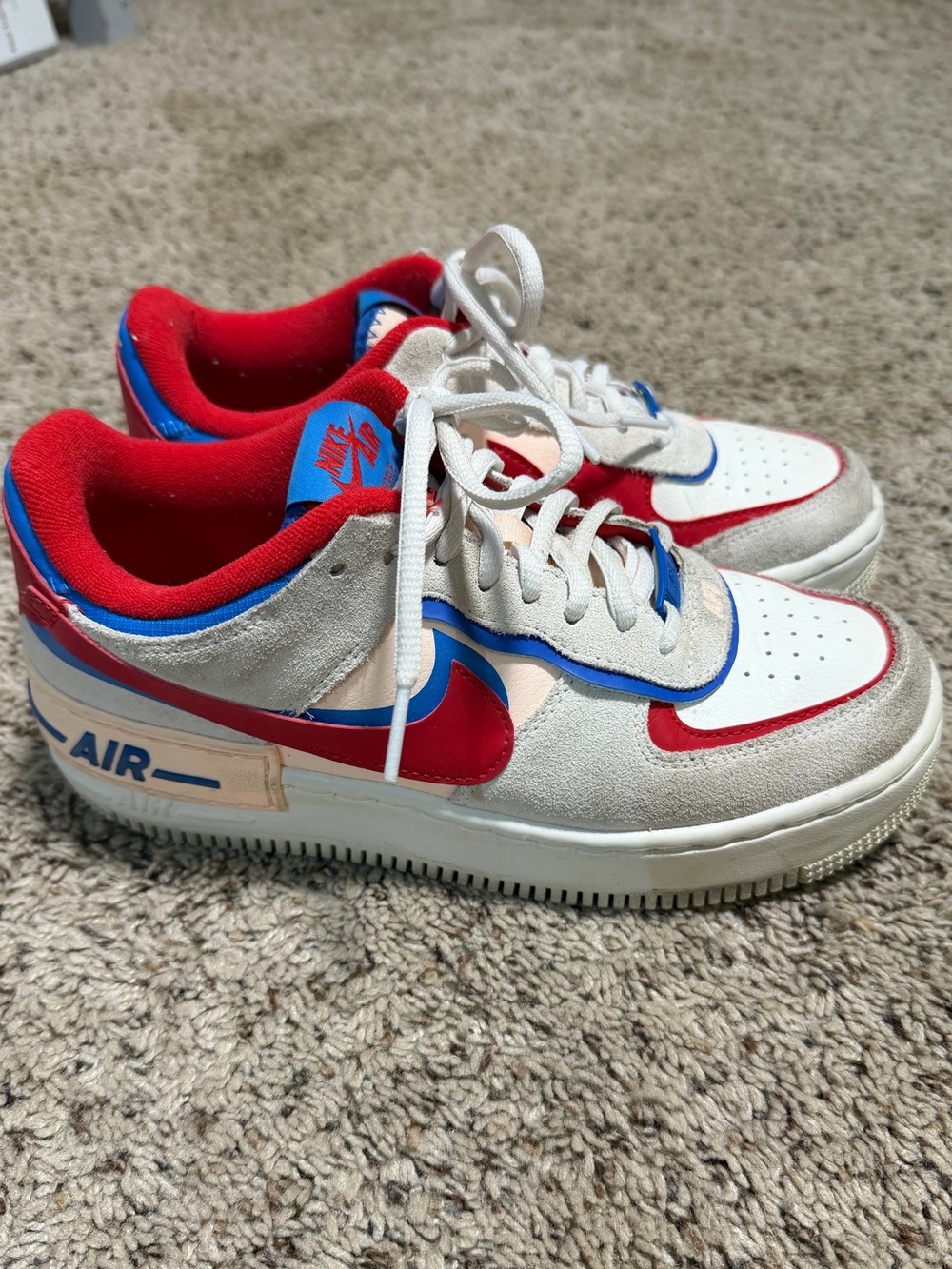 Nike air force 1 women’s red white and blue shoes.